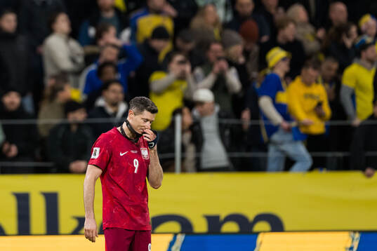 Robert Lewandowski of Poland looks dejected