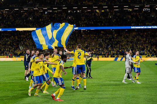 Yasin Ayari and Anthony Elanga of Sweden celebrate