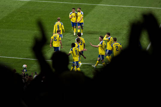 Players of Sweden celebrate