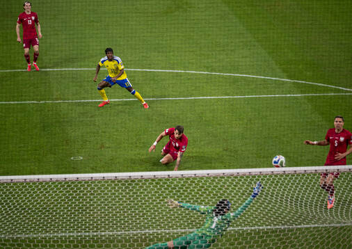 Anthony Elanga of Sweden scores the 1-0 goal