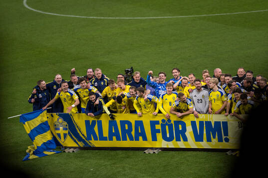 Players of Sweden celebrate