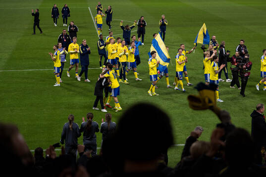 Players of Sweden celebrate