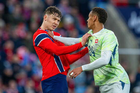 Jørgen Strand Larsen of Norway and Luca Jaquez of