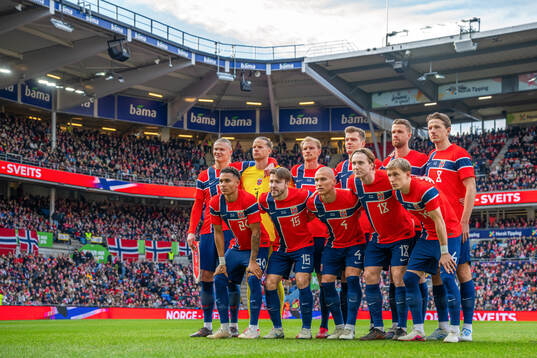 The starting eleven of Norway pose for a team photo