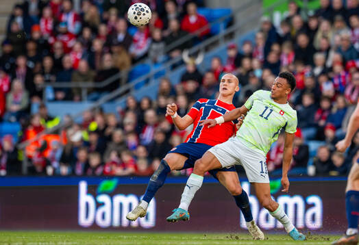 Leo Østigård of Norway and Dan Ndoye of Switzerland