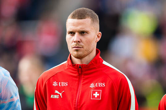 Nico Elvedi of Switzerland
