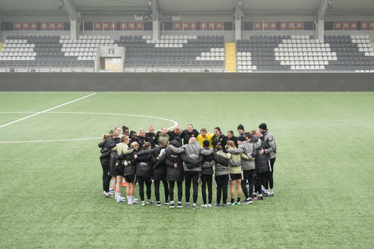 The team gathers