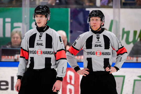 domare Christoffer Holm och domare Mikael Holm