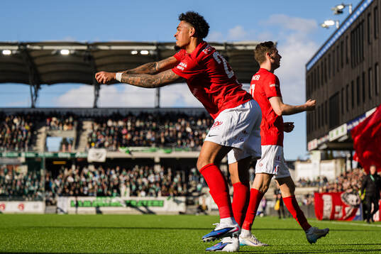 Noah Jean Holm of Brann celebrates