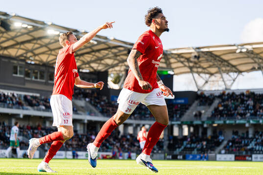 Noah Jean Holm of Brann celebrates