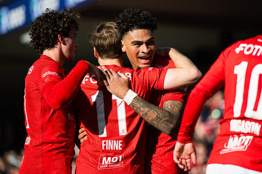 Noah Jean Holm of Brann celebrates