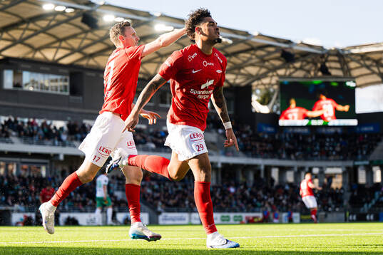 Noah Jean Holm of Brann celebrates
