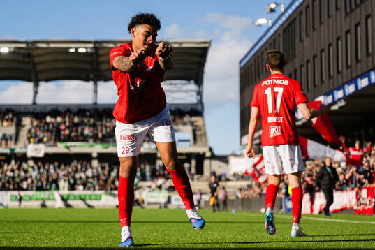 Noah Jean Holm of Brann celebrates