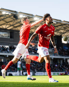 Noah Jean Holm of Brann celebrates