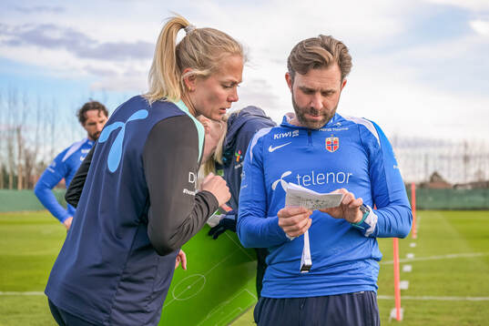 Guro Bergsvand and Mikey Harris, assistant coach of the