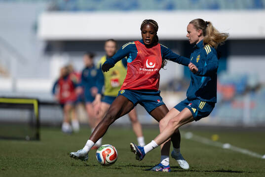 Evelyn Ijeh  at a training session with the women's