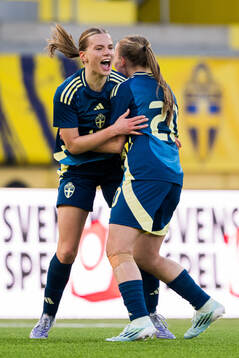 Agnes Ekberg and Fanny Peterson of Sweden celebrate