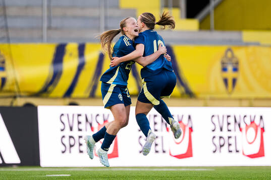 Fanny Peterson and Agnes Ekberg of Sweden celebrate