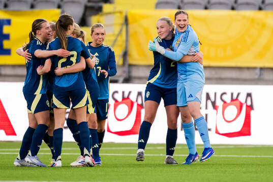 Players of Sweden celebrate