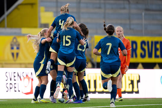 Players of Sweden celebrate