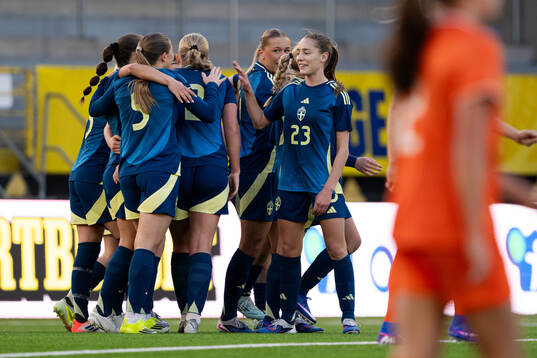 Players of Sweden celebrate