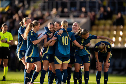 Players of Sweden celebrate