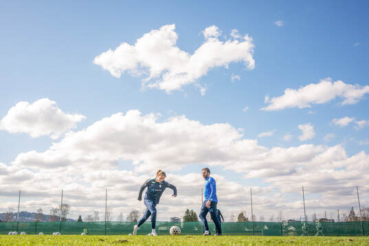 Signe Gaupset and Mikey Harris, assistant coach of the