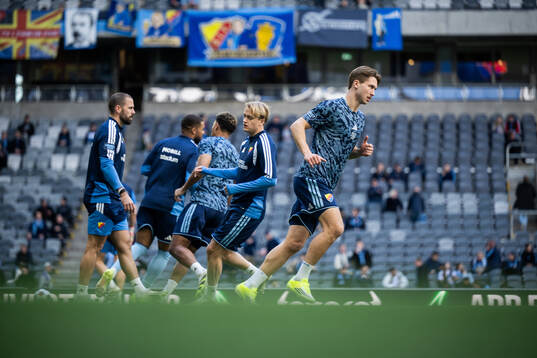 Djurgårdens spelare värmer upp