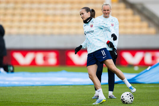 Guro Reiten of Norway warms up