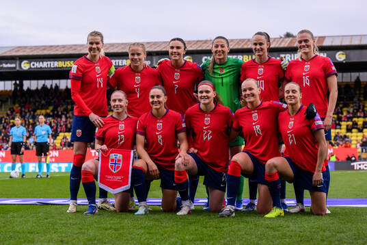 The starting eleven of Norway pose for a photo