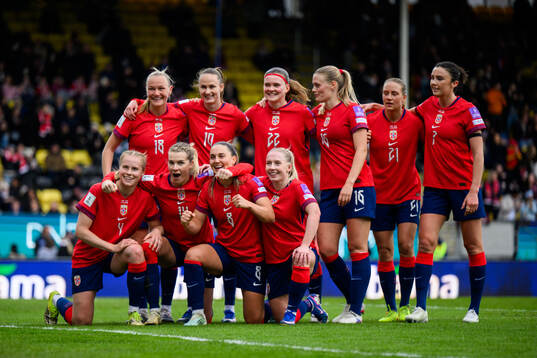 Ada Hegerberg of Norway celebrate with teammates
