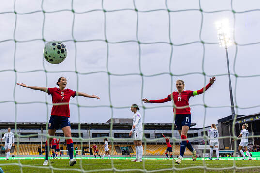 Ingrid Syrstad Engen and Ada Hegerberg of Norway celebrates