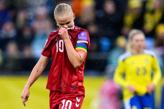 Pernille Harder of Denmark looks dejected