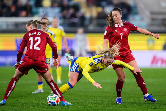 Stine Sandbech and Janni Thomsen of Denmark against Rebecka
