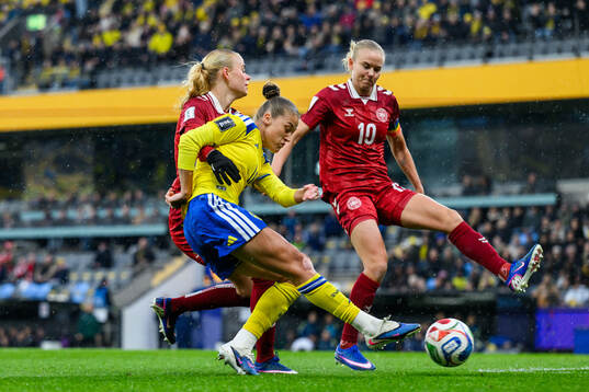 Olivia Holdt and Pernille Harder of Denmark against Filippa