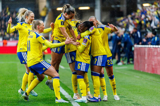 Monica Jusu Bah of Sweden celebrates with teammates