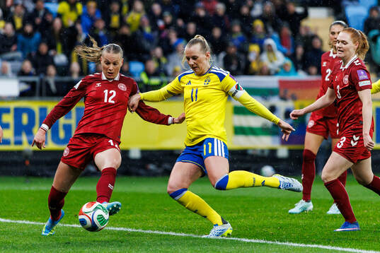 Stine Sandbech of Denmark and Stina Blackstenius of Sweden