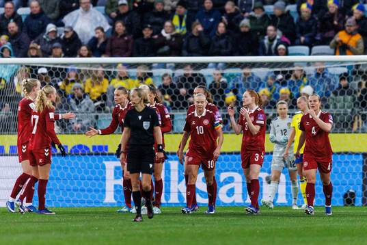 Pernille Harder of Denmark celebrates