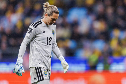 goalkeeper Jennifer Falk of Sweden looks dejected