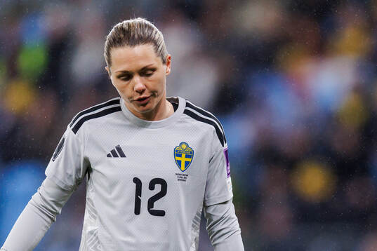 goalkeeper Jennifer Falk of Sweden looks dejected