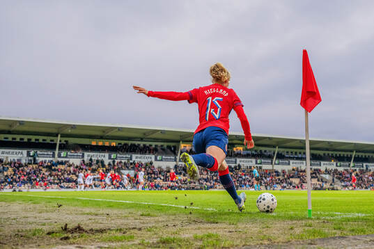 Justine Kielland of Norway takes a corner kick