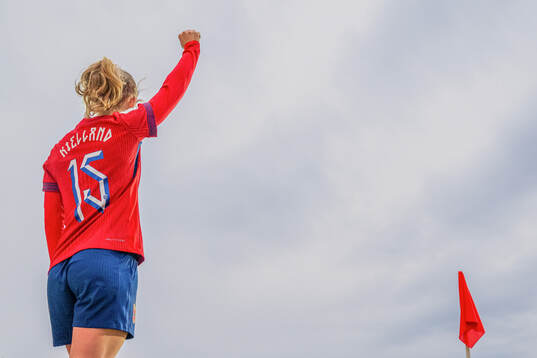 Justine Kielland of Norway prepares to take a corner kick