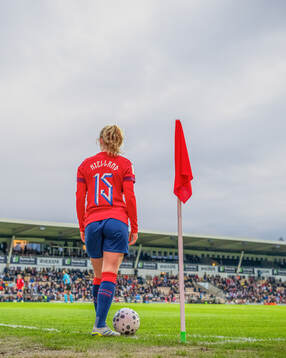 Justine Kielland of Norway prepares to take a corner kick