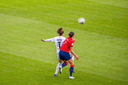 Nina Kajzba of Slovenia and Ingrid Syrstad Engen of Norway