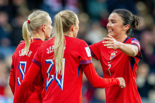 Karina Sævik of Norway celebrates with Synne Sofie Kinden