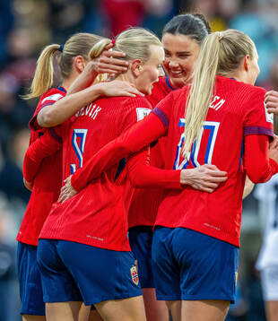 Karina Sævik of Norway celebrates with Ingrid Syrstad