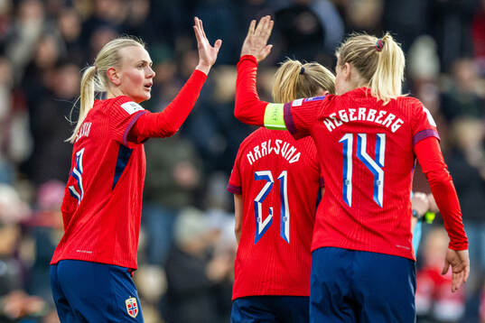 Karina Sævik of Norway celebrates with teammate Ada