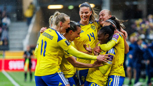 Monica Jusu Bah of Sweden celebrates with teammates