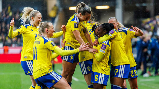 Monica Jusu Bah of Sweden celebrates with teammates