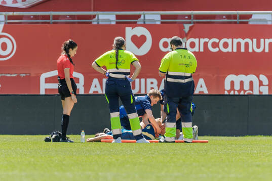 Hanna Wijk of Sweden receives medical attention